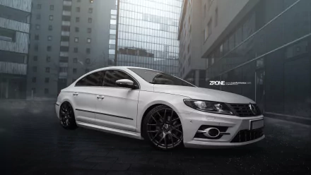 A sleek white Volkswagen CC parked in a modern urban setting, showcased as a 4K Ultra HD PC desktop wallpaper and background.