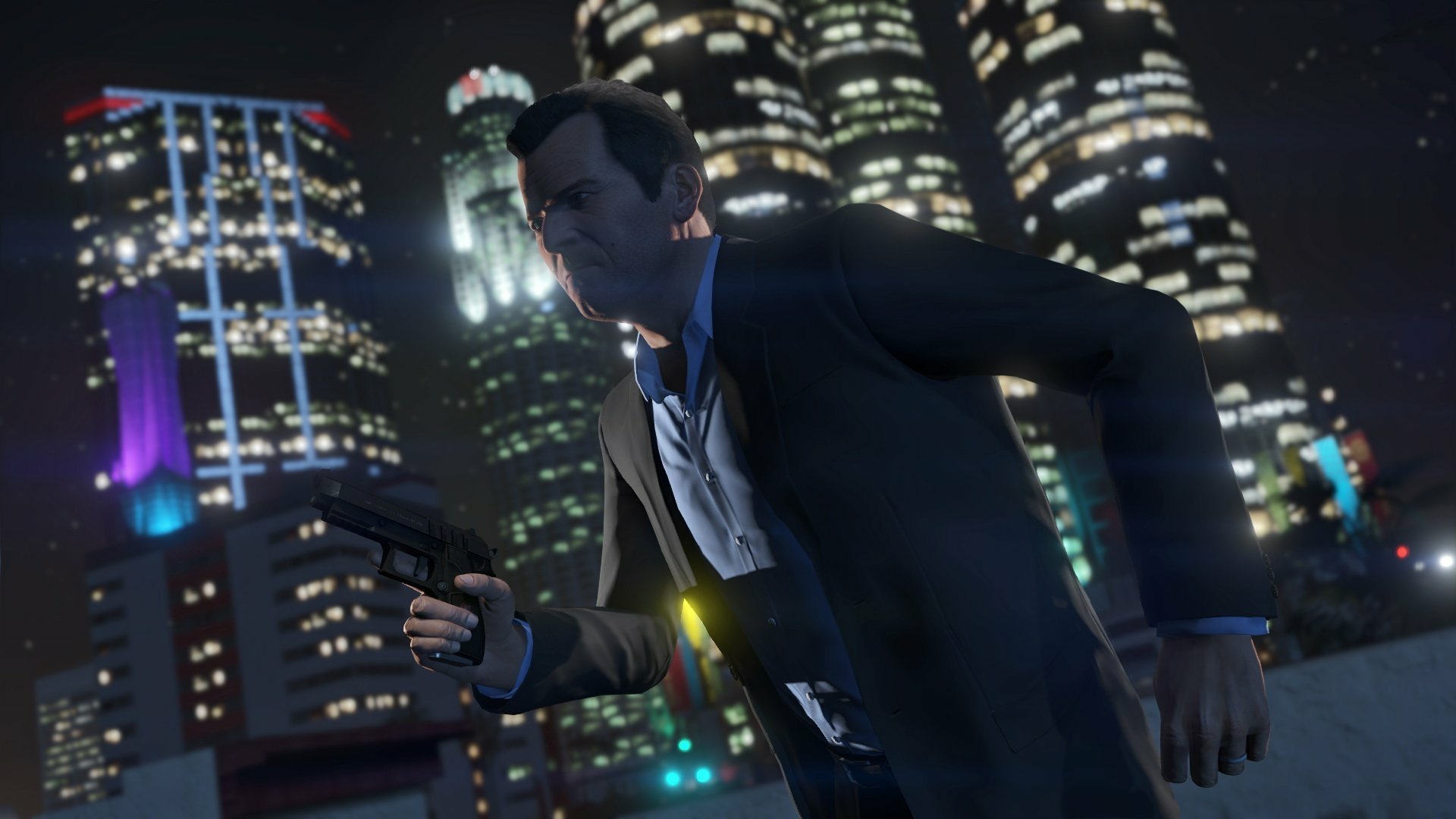 A character from Grand Theft Auto V, holding a gun in a cityscape at night, surrounded by bright skyscrapers, serves as a striking HD PC desktop wallpaper and background.