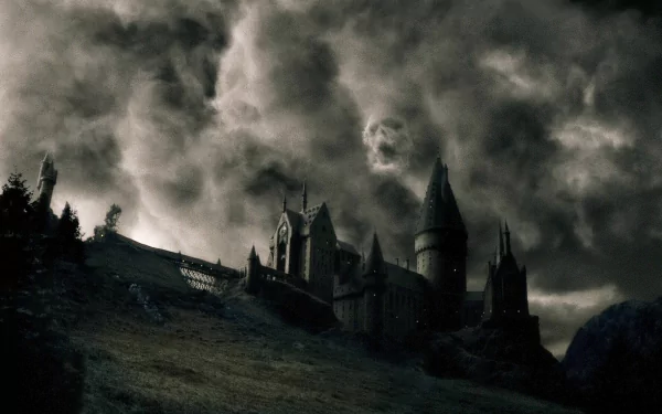 HD desktop wallpaper featuring Hogwarts Castle under a dark, stormy sky, inspired by the Harry Potter movie series.