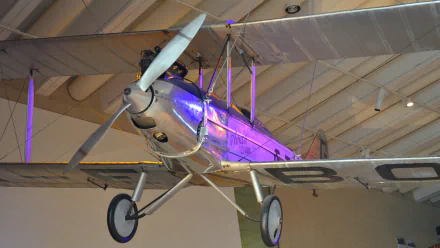 HD wallpaper featuring a vintage British Avro Avian biplane aircraft displayed in Brisbane museum, showcasing classic aviation history and design.