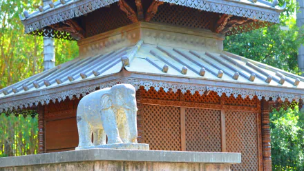 Nepalese pagoda architecture in Brisbane, Australia with a carved elephant statue on a man-made plinth — HD PC desktop wallpaper