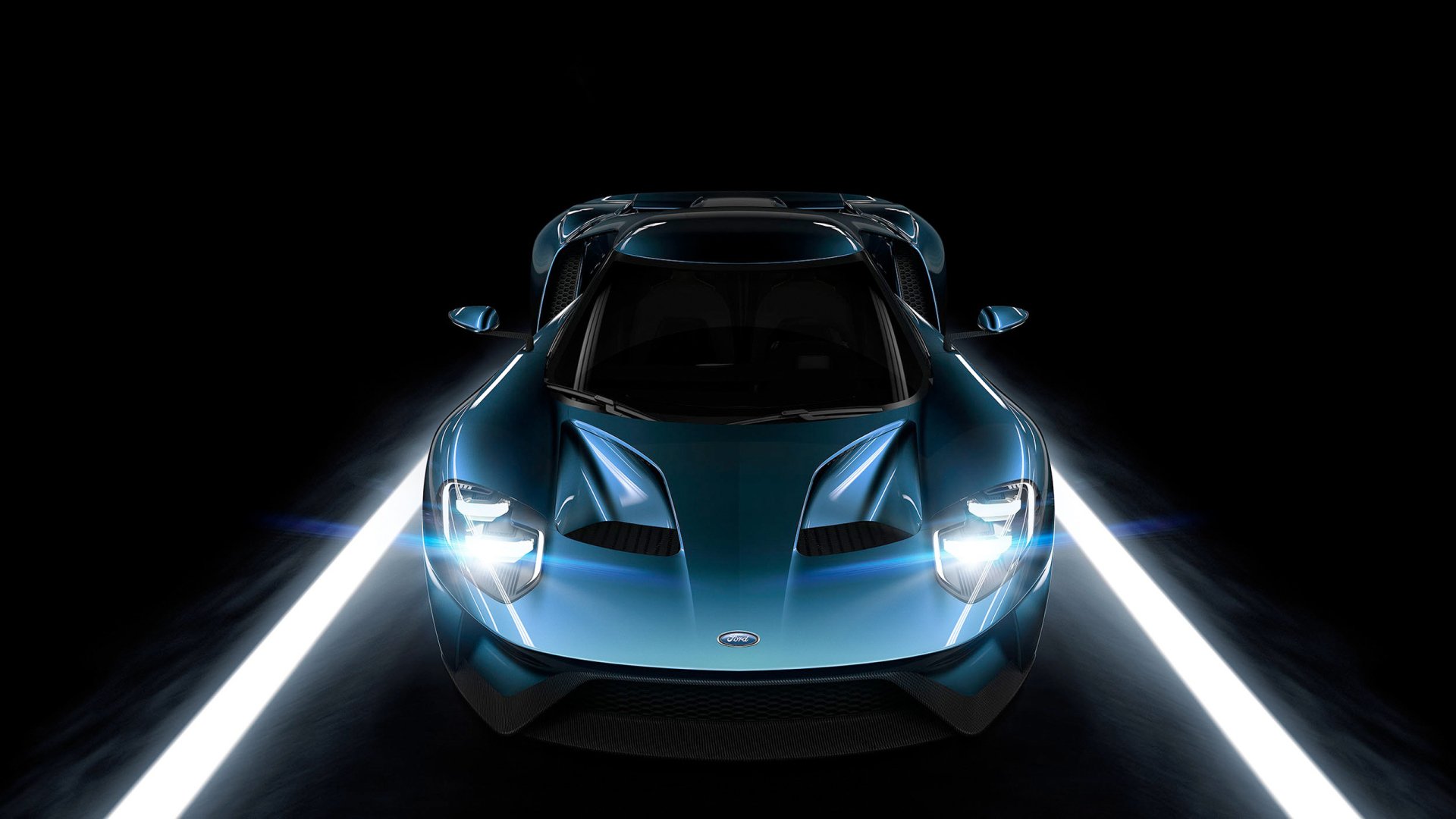 HD desktop wallpaper featuring a sleek Ford GT sports car illuminated against a dark background with bright light streaks on either side.