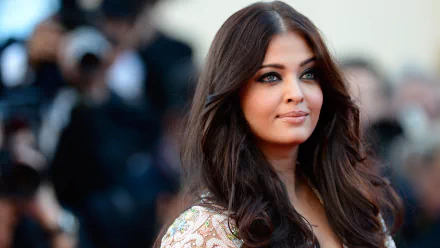 A stunning 4K Ultra HD desktop wallpaper featuring Aishwarya Rai, a prominent Bollywood celebrity, captured in a glamorous moment at an event.
