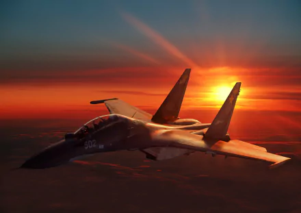 A stunning HD desktop wallpaper featuring a Sukhoi Su-30 military jet flying against a vivid sunset backdrop, with the sun casting a warm glow over the aircraft.