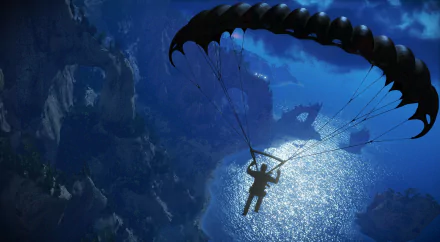Rico Rodriguez from Just Cause 3 parachutes over a sunlit ocean and rugged cliffs in this HD PC desktop wallpaper from the video game.