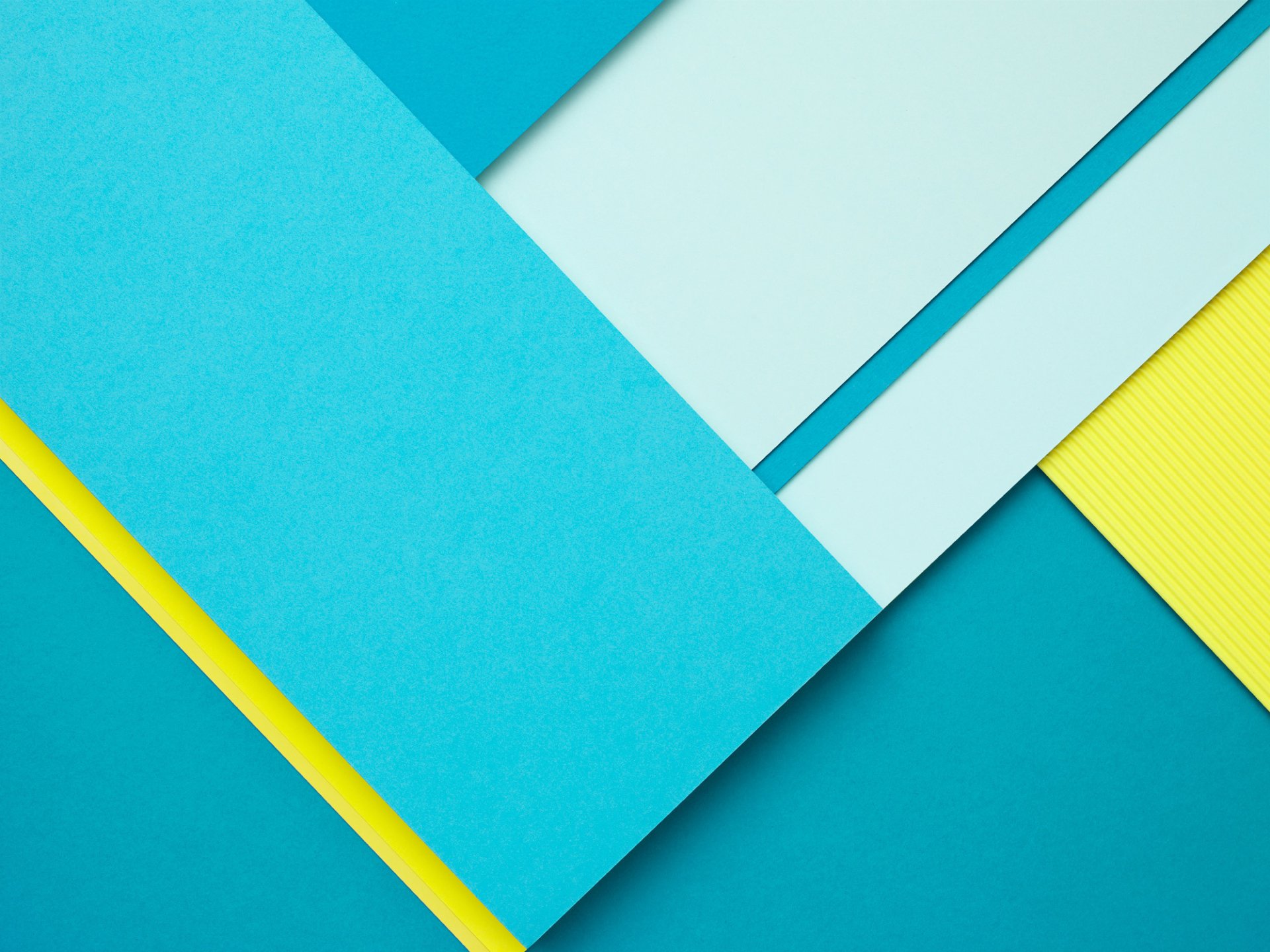 Abstract HD PC desktop wallpaper featuring overlapping geometric shapes in vibrant blue, light blue, and yellow tones.