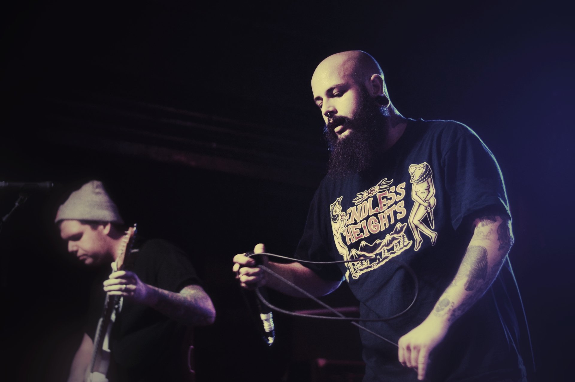 HD desktop wallpaper of Being As An Ocean band members performing on stage.