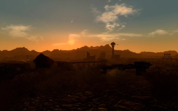 HD PC desktop wallpaper featuring a sunset landscape from the video game Fallout 3, showcasing a post-apocalyptic environment with ruins and distant mountains.