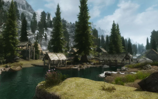 HD desktop wallpaper featuring a serene village scene from The Elder Scrolls V: Skyrim, with wooden houses, tall pine trees, a river, and distant mountains under a partly cloudy sky.