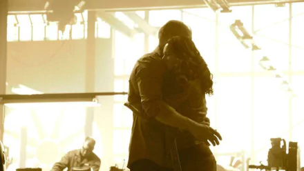 A warm and emotional scene from Furious 7, featuring two characters embracing, set against a backdrop of dramatic lighting. This HD wallpaper captures a poignant moment from the film.