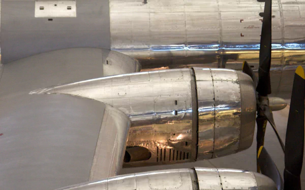 Close-up view of the polished engine and propeller of a Boeing B-29 Superfortress, featured in a high-definition military desktop wallpaper.