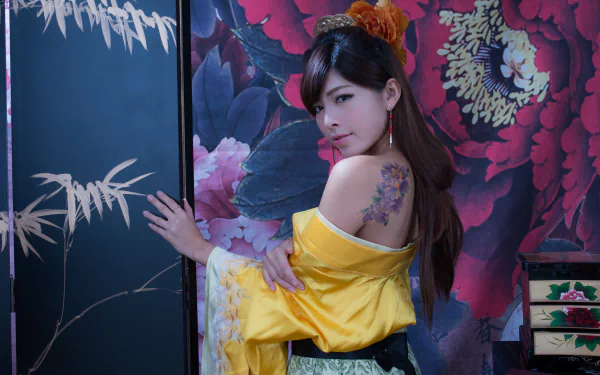 A Taiwanese woman in traditional costume poses against a vibrant floral background, showcasing her tattoo and elegant hair design, captured in rich 4K Ultra HD detail.