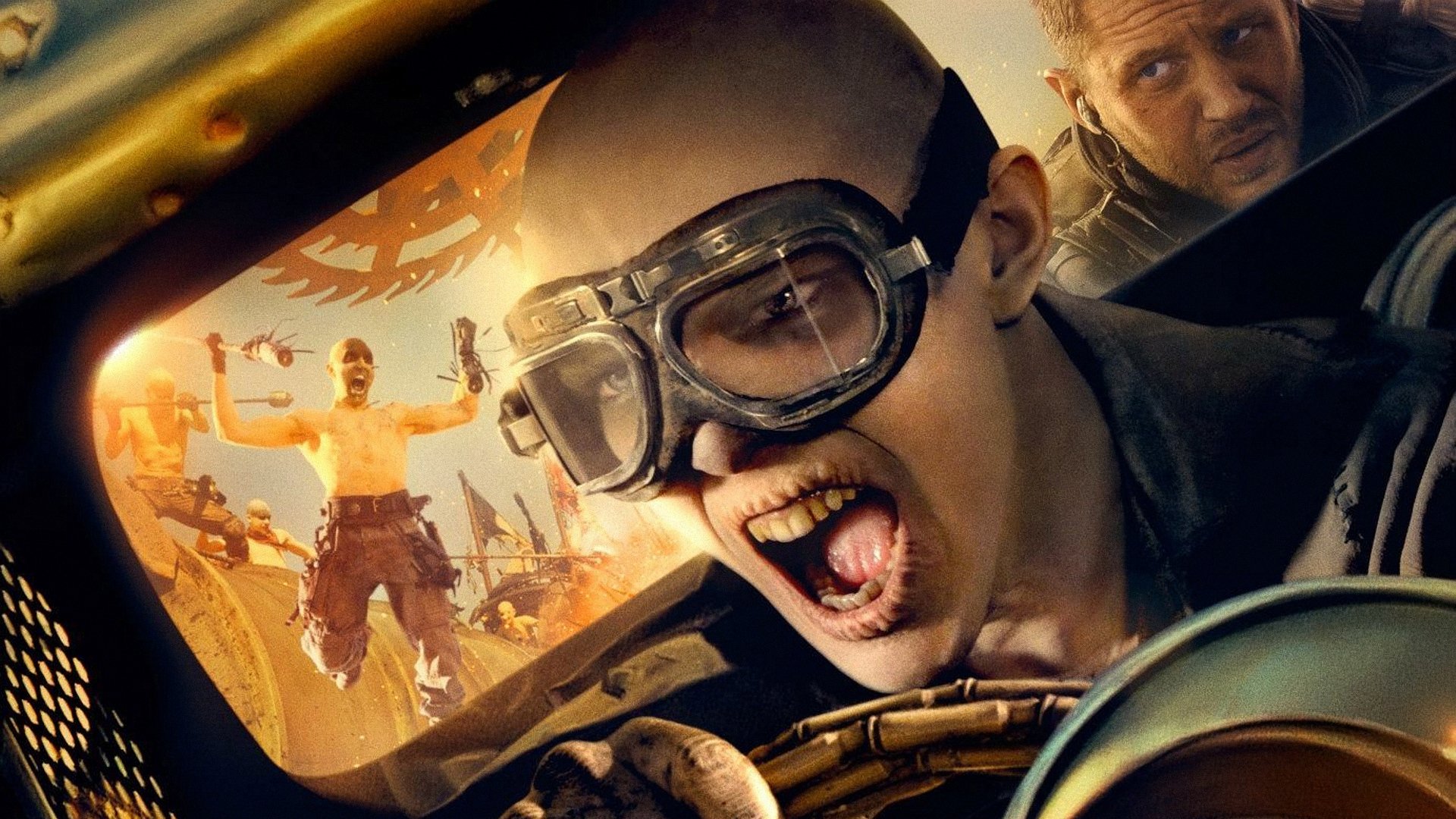 HD PC desktop wallpaper featuring Nux (Nicholas Hoult) and Max Rockatansky (Tom Hardy) from the movie Mad Max: Fury Road in an intense action scene.