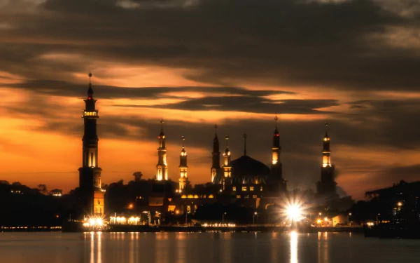 Samarinda Islamic Center in East Kalimantan, Borneo, is beautifully illuminated under a night sky, reflecting the peaceful ambiance of Islam in Indonesia.