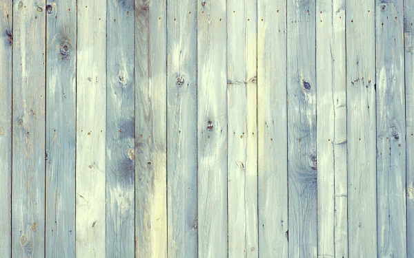 HD desktop wallpaper featuring an artistic wooden texture with light weathered planks in various shades of pale blue and soft white.