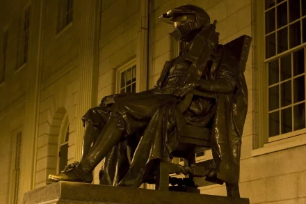 HD desktop wallpaper featuring a statue of a soldier from the Halo video game series, sitting in a chair against an architectural background.