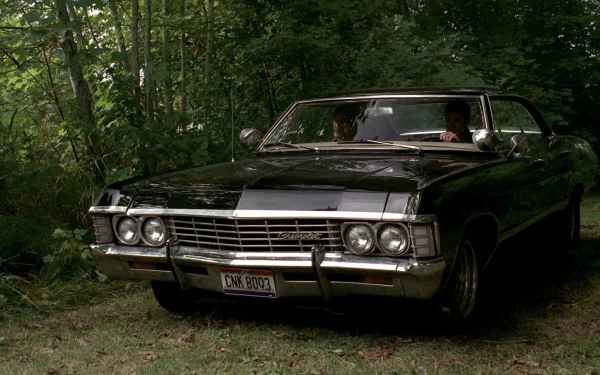 A classic Chevrolet Impala parked in a lush green setting, showcasing Sam and Dean Winchester from the TV show Supernatural in a striking HD desktop wallpaper.