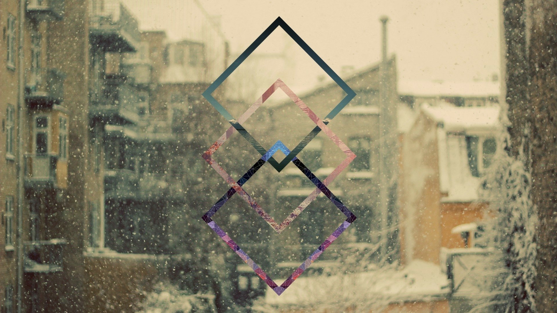 Artistic polyscape HD desktop wallpaper featuring overlapping transparent geometric squares against a softly blurred snowy urban background.