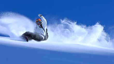 A snowboarder carves down a snowy slope against a clear blue sky, embodying the thrill of winter sports in this stunning 4K Ultra HD wallpaper.