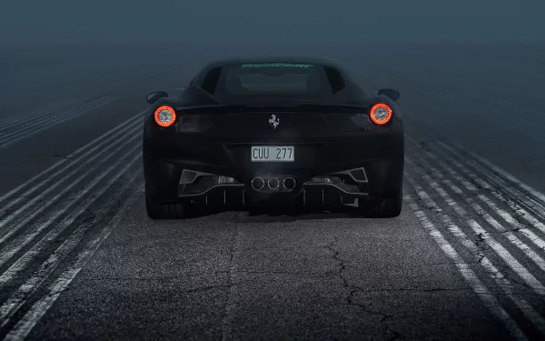 Rear view of a black Ferrari 458 Italia on a foggy road, featured as an HD PC desktop wallpaper and background.