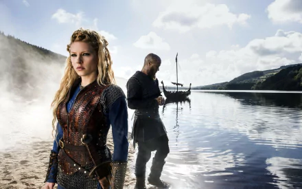 A striking scene from Vikings (2013), featuring Lagertha, played by Katheryn Winnick, alongside a ship in a serene fjord setting, embodying the show's epic storytelling.