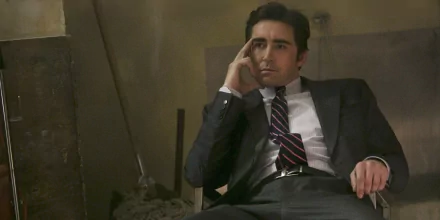 HD wallpaper of Joe MacMillan portrayed by Lee Pace in Halt And Catch Fire, looking pensive in a suit and tie.