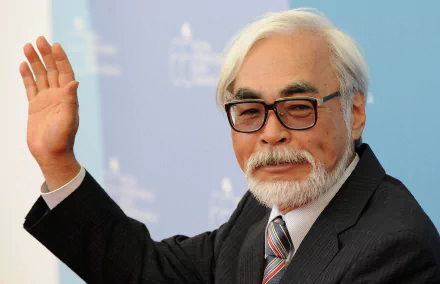 HD wallpaper of a distinguished man waving, tagged with Hayao Miyazaki, for desktop backgrounds.