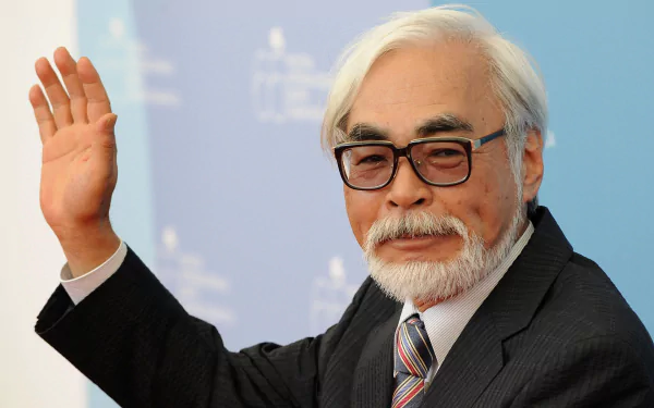 HD wallpaper of a distinguished man waving, tagged with Hayao Miyazaki, for desktop backgrounds.
