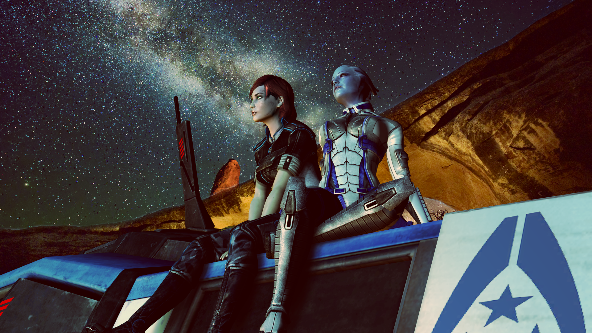 Commander Shepard and Liara T'Soni gaze at a starry night, capturing the essence of the Mass Effect universe in this stunning HD PC desktop wallpaper.