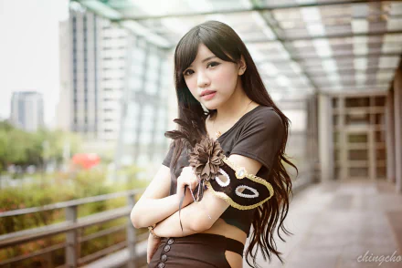 4K Ultra HD image of a Taiwanese Asian model wearing a black mask and outfit, standing against a modern urban background with bokeh effects.