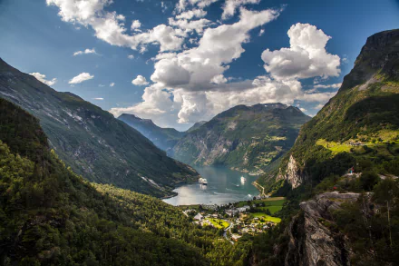 A stunning view of Geirangerfjord in Norway, featuring a cruise ship surrounded by majestic mountains, lush greenery, and dramatic clouds under a bright sky. Perfect nature scenery.