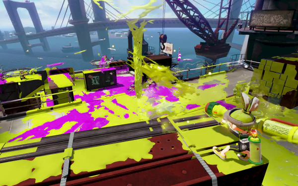 HD Splatoon-themed desktop wallpaper featuring vivid in-game action with characters and colorful ink splatters.
