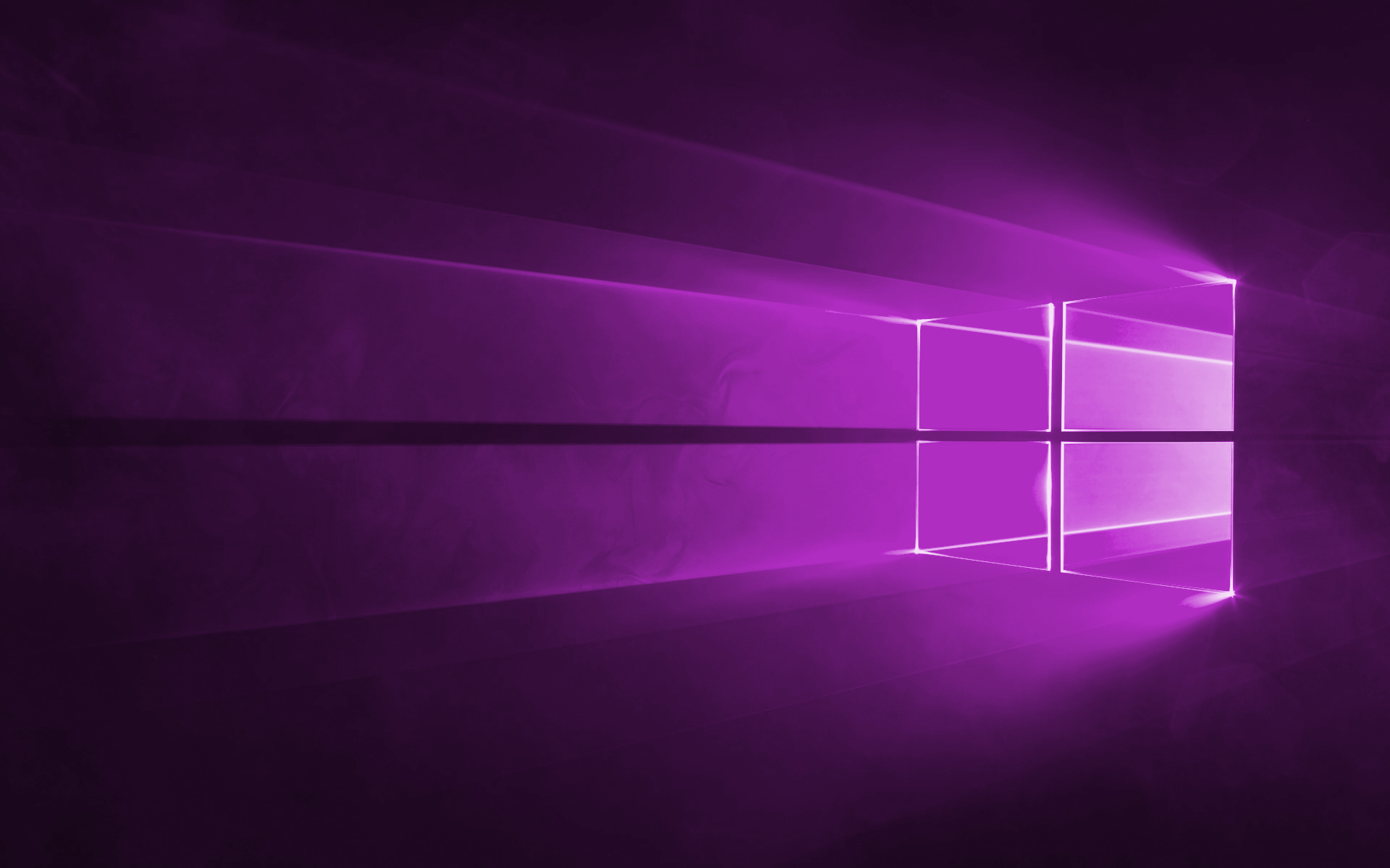 HD PC desktop wallpaper featuring a vibrant purple Windows 10 logo with light beams extending from the window panes, highlighting technology themes.