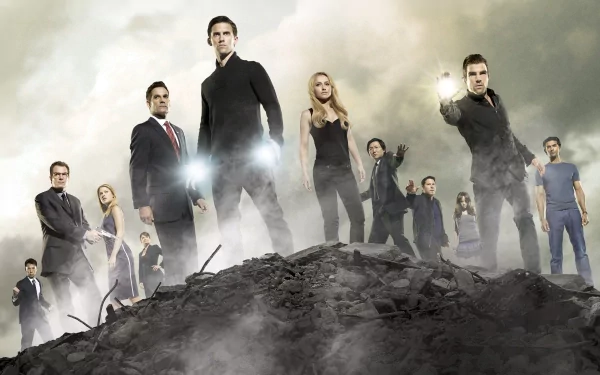 An HD desktop wallpaper featuring characters from the TV show Heroes, standing confidently on a rocky landscape with dramatic lighting and a sense of action and intrigue.