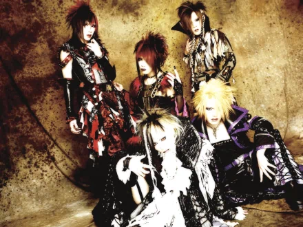 HD desktop wallpaper of a five-member J-Rock visual-kei band in dramatic, phantasmagoric costumes and makeup against a textured sepia background, evoking dark music aesthetics.