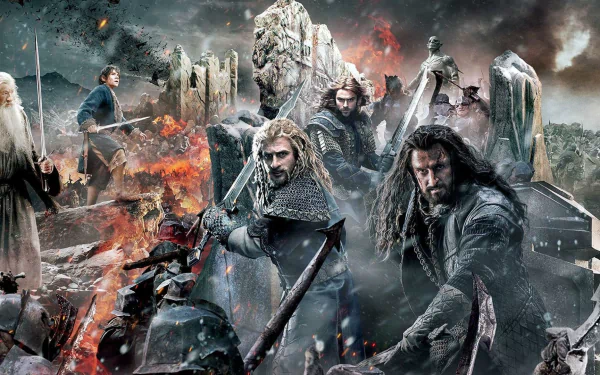 HD PC desktop wallpaper from the movie The Hobbit: The Battle of the Five Armies — epic battlefield with armored warriors, orcs, flames and a crumbling fortress beneath a stormy sky.