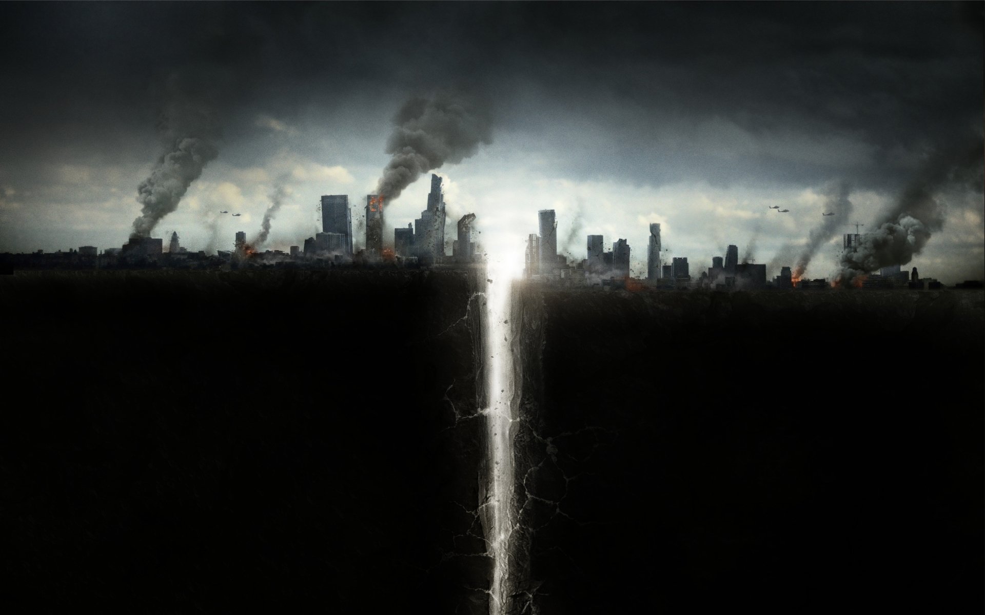San Andreas movie 2K Quad HD PC desktop wallpaper and background: stormy skyline split by a glowing fault line, buildings crumbling and smoke rising.
