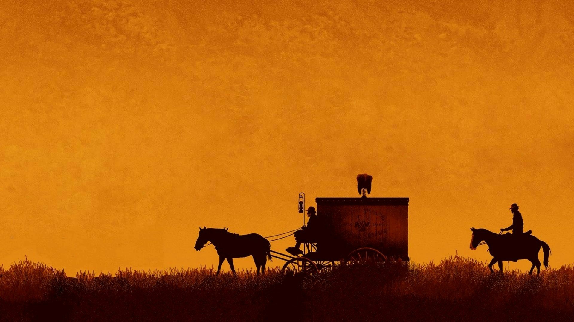 Artistic western HD PC desktop wallpaper and background: silhouettes of a horse-drawn wagon and a mounted rider crossing a grassy plain against a textured orange sky.