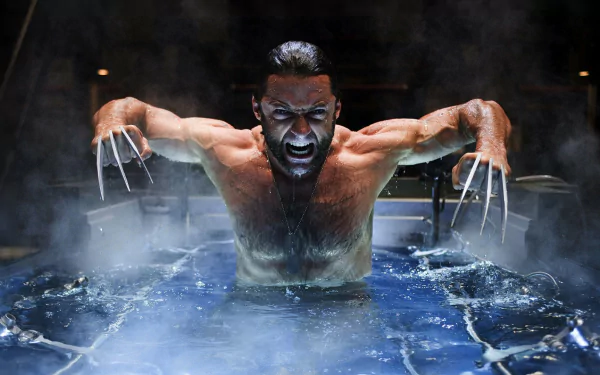HD wallpaper from the movie X-Men Origins: Wolverine, showing Wolverine emerging from a tank with claws extended and an intense expression. Background shrouded in mist and water.