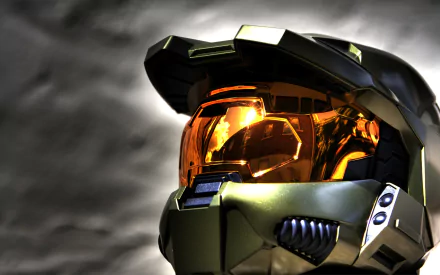 HD PC desktop wallpaper featuring Master Chief from the video game Halo, showcasing his iconic helmet with a reflective orange visor against a dramatic cloudy background.