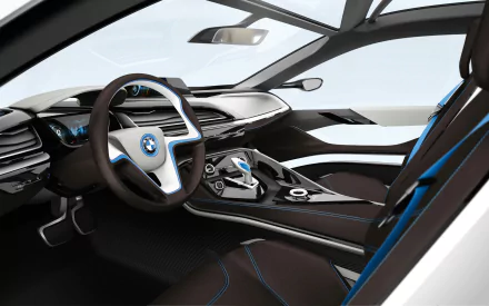 A sleek interior view of a BMW i8, showcasing its modern design, intricate dashboard, and stylish seating. This high-definition image serves as a dynamic desktop wallpaper.