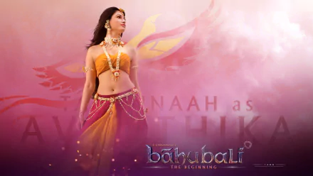 HD desktop wallpaper featuring Tamannaah Bhatia as Avanthika from the movie Baahubali: The Beginning, set against a soft pink and orange background.