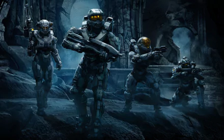 HD desktop wallpaper featuring characters from Halo 5: Guardians, showcasing a dynamic scene with armored figures in a dark, atmospheric setting.