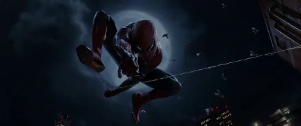 Dynamic HD wallpaper featuring Spider-Man from *The Amazing Spider-Man*, swinging through a nighttime cityscape under a full moon.
