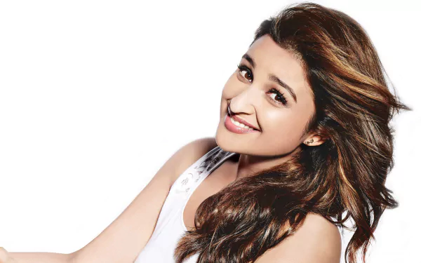 A stunning HD wallpaper featuring celebrity Parineeti Chopra, smiling brightly with flowing hair, set against a clean white background.