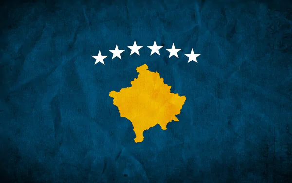 HD PC desktop wallpaper: textured blue Kosovo flag background with a gold silhouette of Kosovo centered and six white stars arched above.
