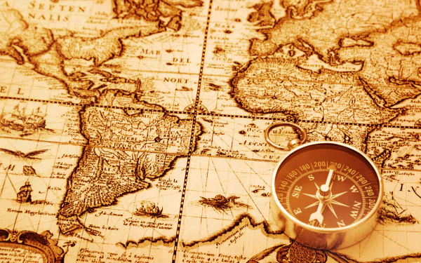 A vintage world map with detailed landmasses and subtle textures, accompanied by a classic compass, creates an intriguing HD desktop wallpaper and background.