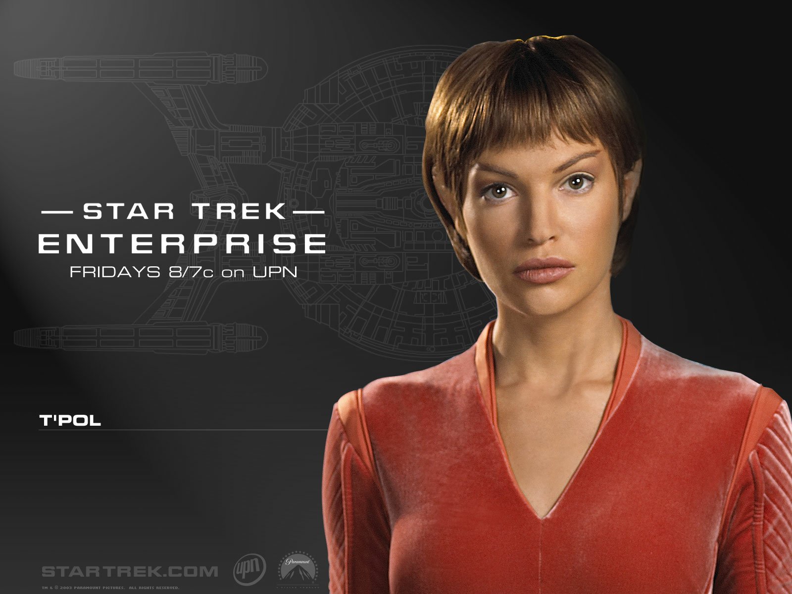 HD PC desktop wallpaper: portrait of a Vulcan officer from the TV show Star Trek: Enterprise against a dark schematic background with the series logo.