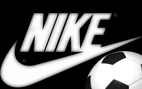 HD desktop wallpaper featuring the Nike logo in bold white letters on a black background, accompanied by a soccer ball.