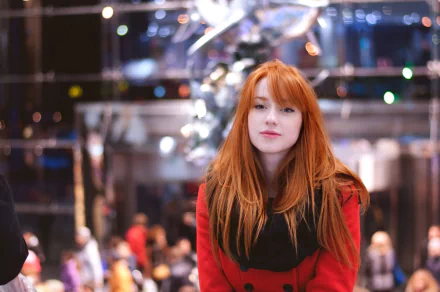HD PC desktop wallpaper featuring a woman with long red hair and a black scarf, against a blurred urban nightlife background.